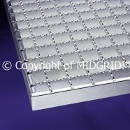pressed gratings with serrated bearing bars and transverse bars